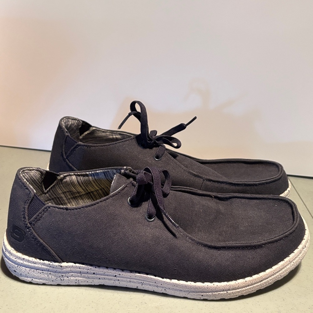 Casual dark, gray Men’s Sketchers, relaxed fit slip ons Canvas Shoes size 10